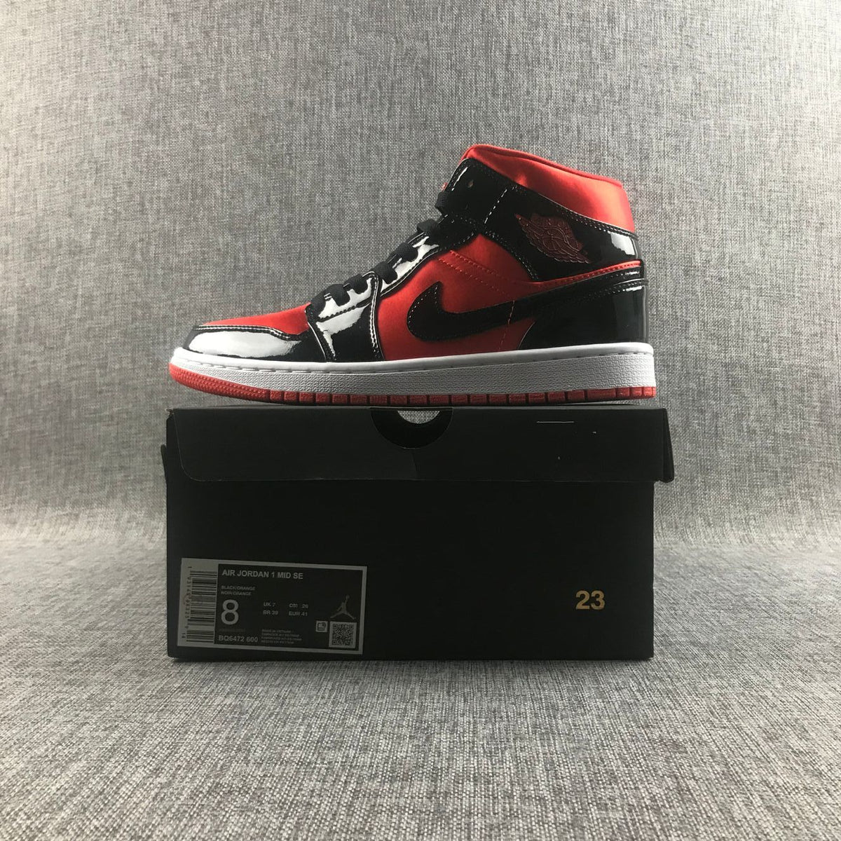Air Jordan 1 Mid Sneakers in Black Red White BQ6472-600 - product image from the listing.