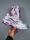 Nike Air Max Moto 2K Low-Top Running Shoes in White Pink - product image from the listing.