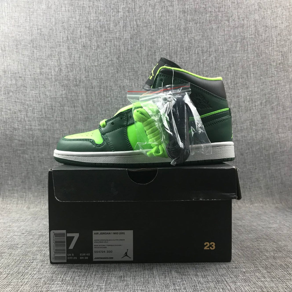 Air Jordan 1 Mid Fluorescent Sneakers in Green 554724-330 - product image from the listing.