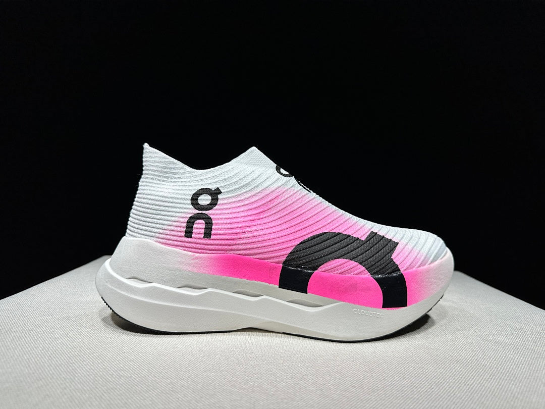On Cloudboom Strike LS Running Sneakers in White/Pink - product image from the listing.