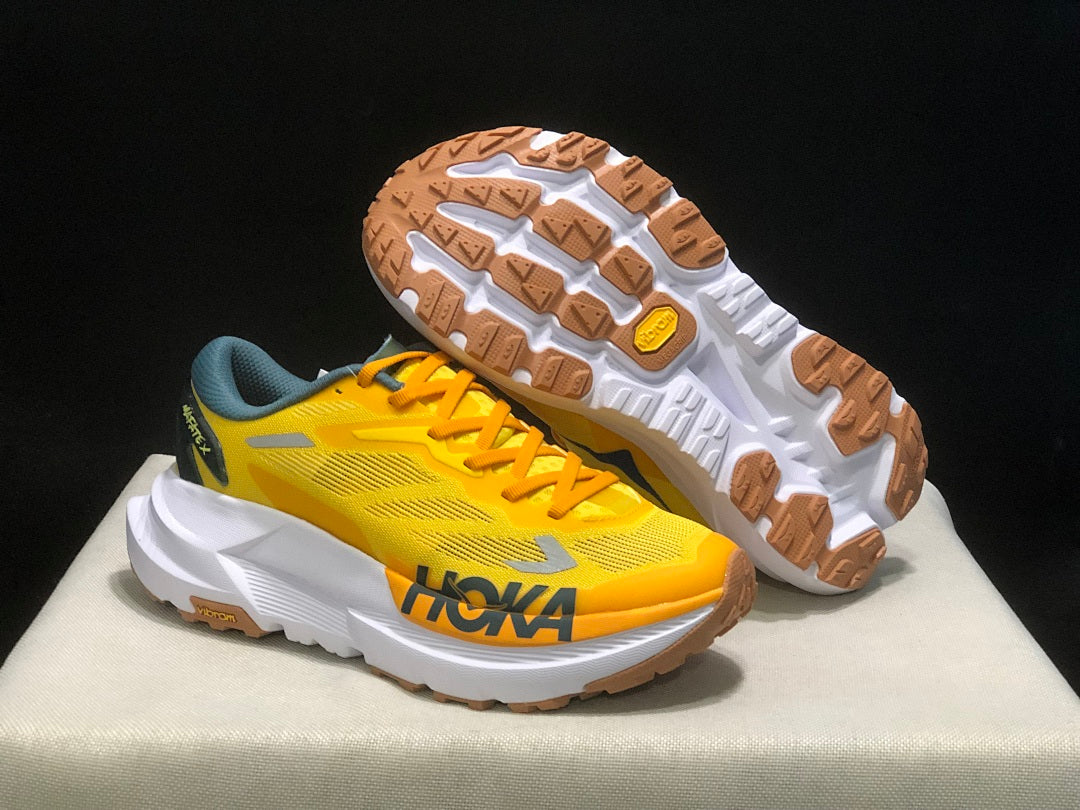 Yellow HOKA Mafate X Trail Running Shoes - product image from the listing.