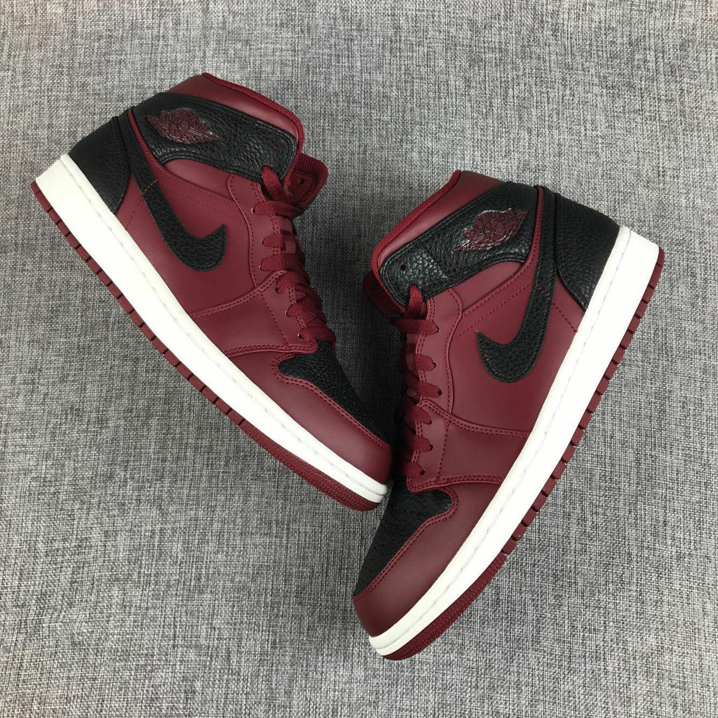 Air Jordan 1 Mid Sneakers in Black and Burgundy 554724-601 - product image from the listing.