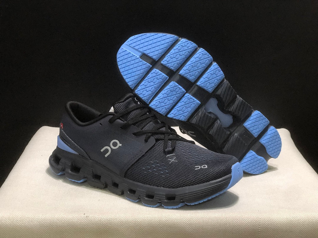 On Cloud X 4 Running Sneakers in Navy - product image from the listing.