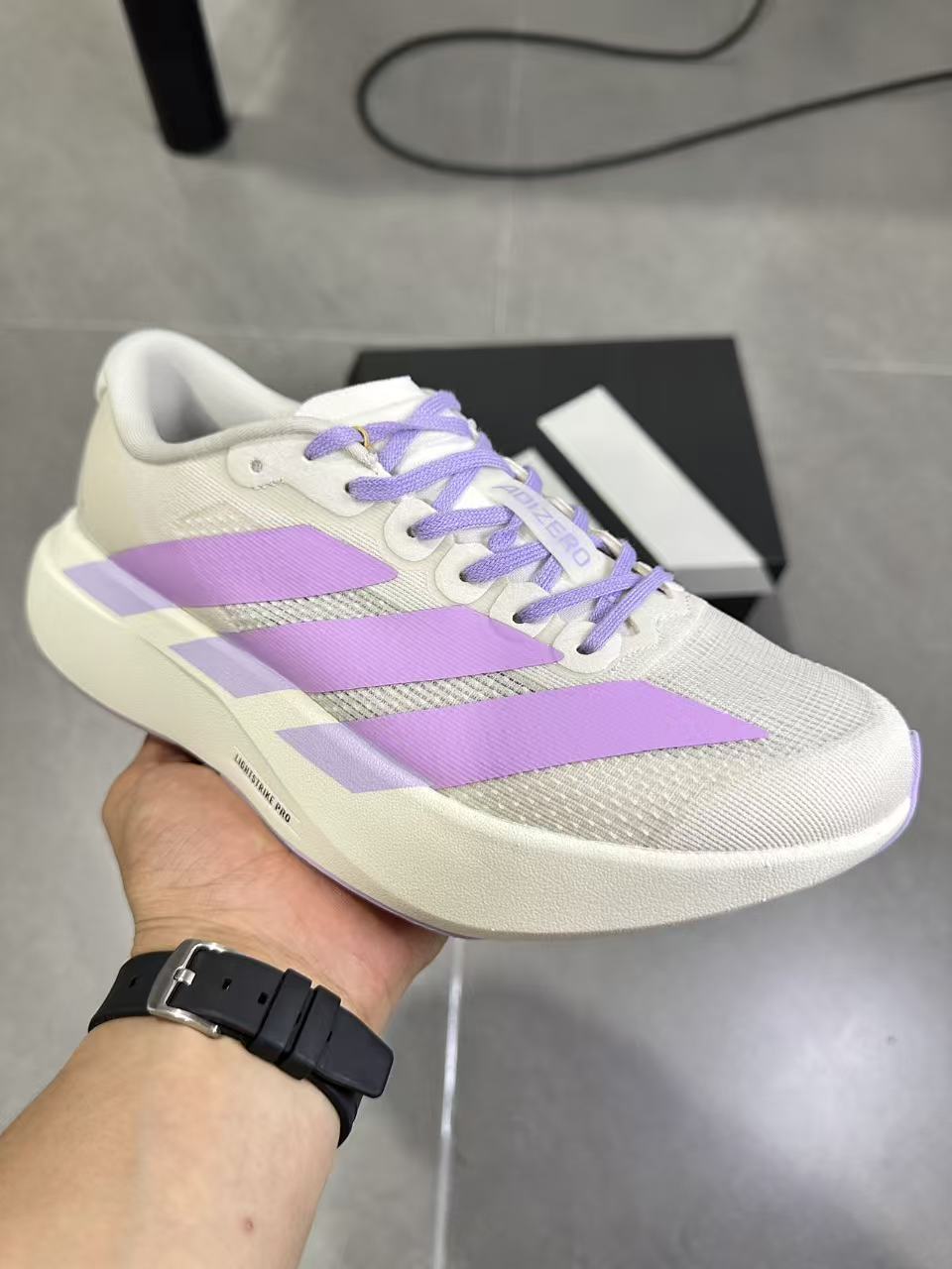 adidas Lightstrike Pro Running Shoes in White Purple KI7354 - product image from the listing.