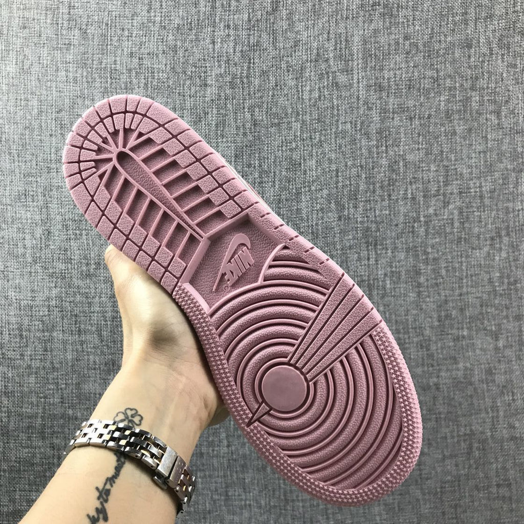 Women's Jordan 1 Mid Pink Sneakers 555112-100 - product image from the listing.
