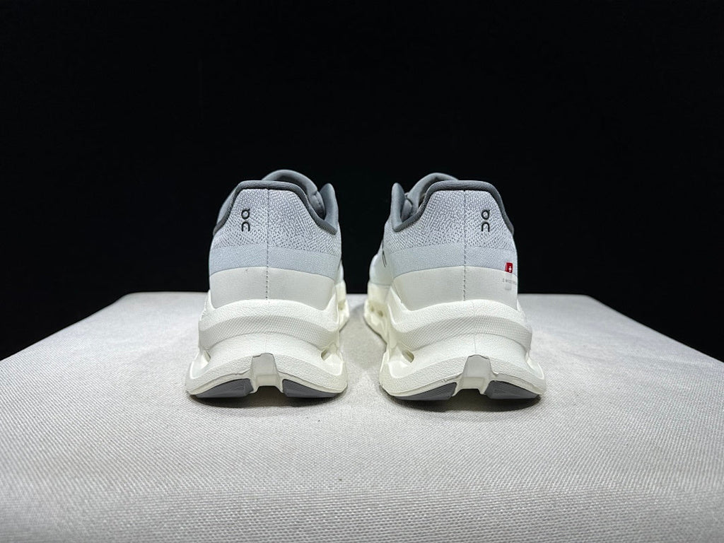 On Cloudtilt Sneakers, in Gray and White - product image from the listing.