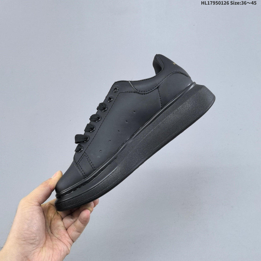 Alexander McQueen Low-Cut Sneakers in Black with Thick Sole - product image from the listing.