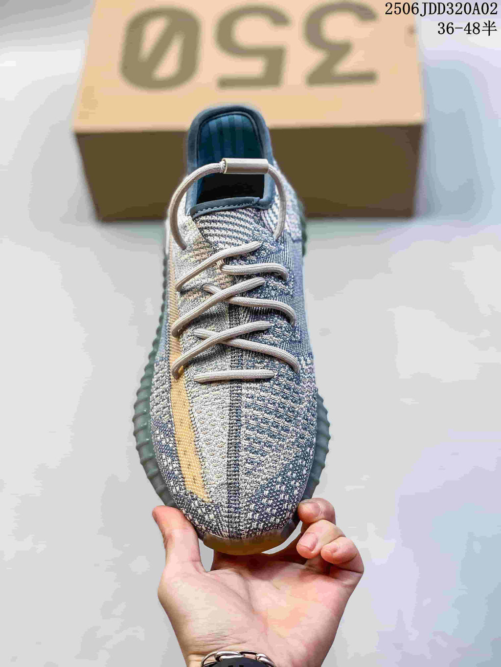 Adidas Yeezy Boost 350 Sneakers in Grey and Tan - product image from the listing.