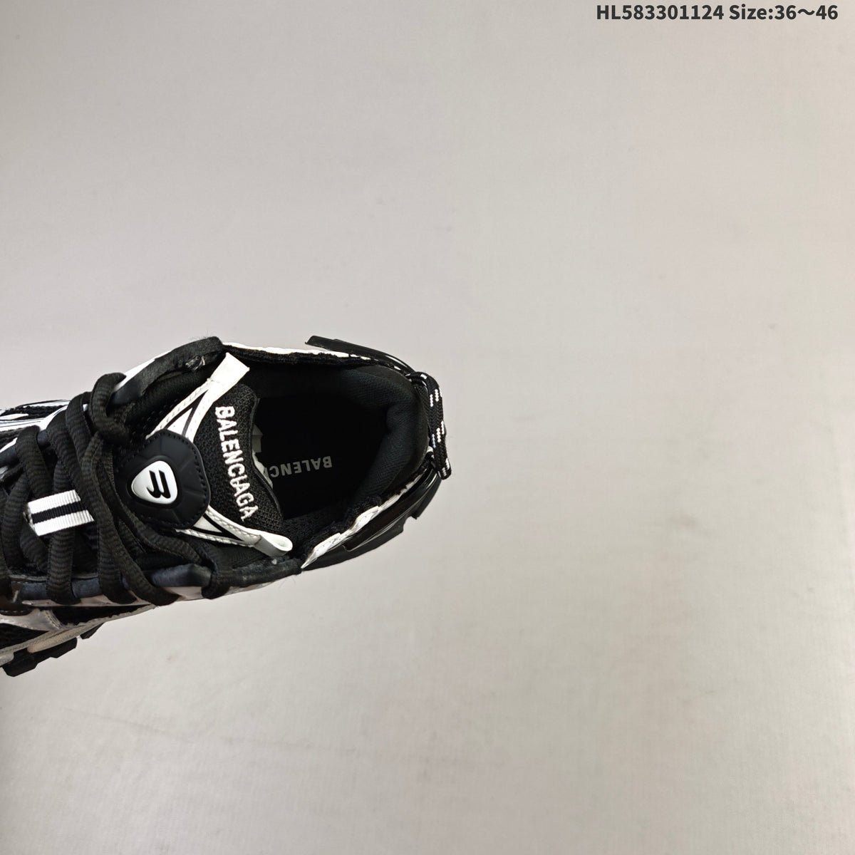 Black and White Balenciaga Runner Low-Top Sneakers - product image from the listing.