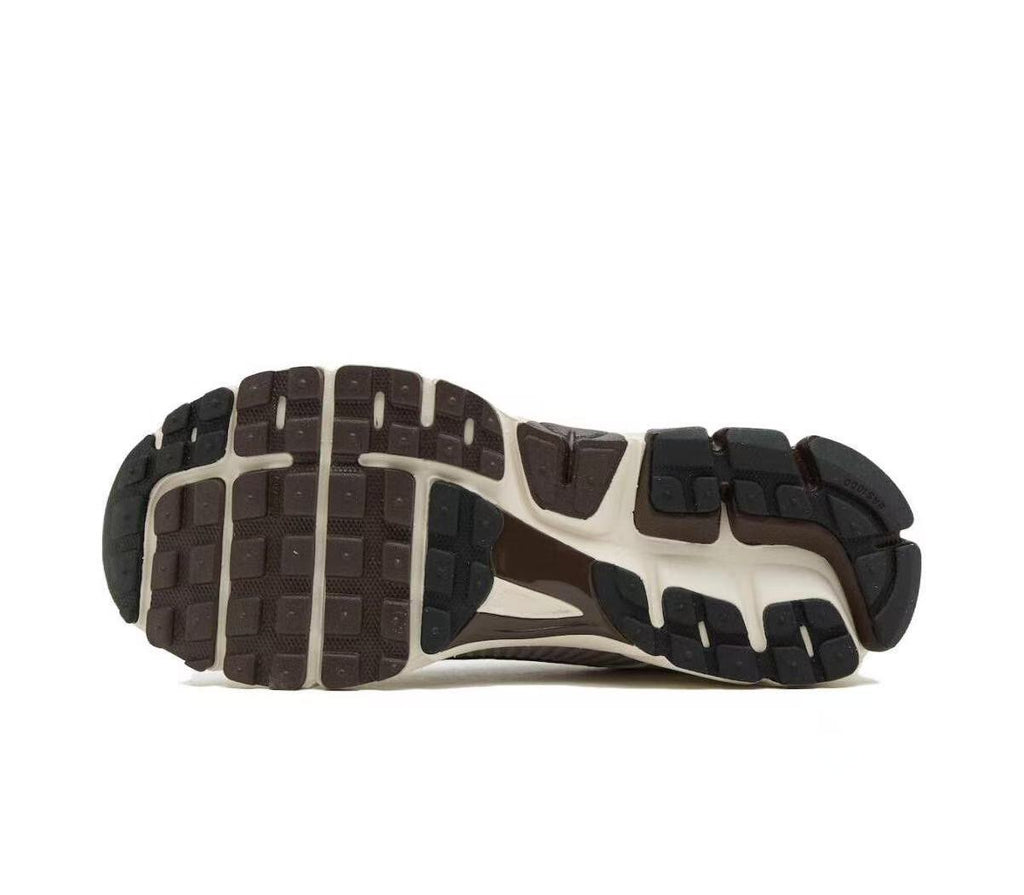 Metallic Silver and White Nike Vomero 5 Sneakers - product image from the listing.
