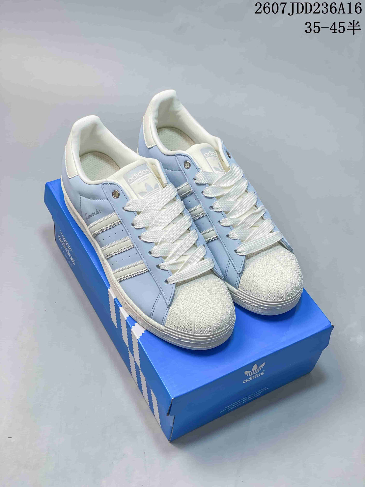 adidas Superstar Sneakers in Light Blue and White JDD236A16 - product image from the listing.