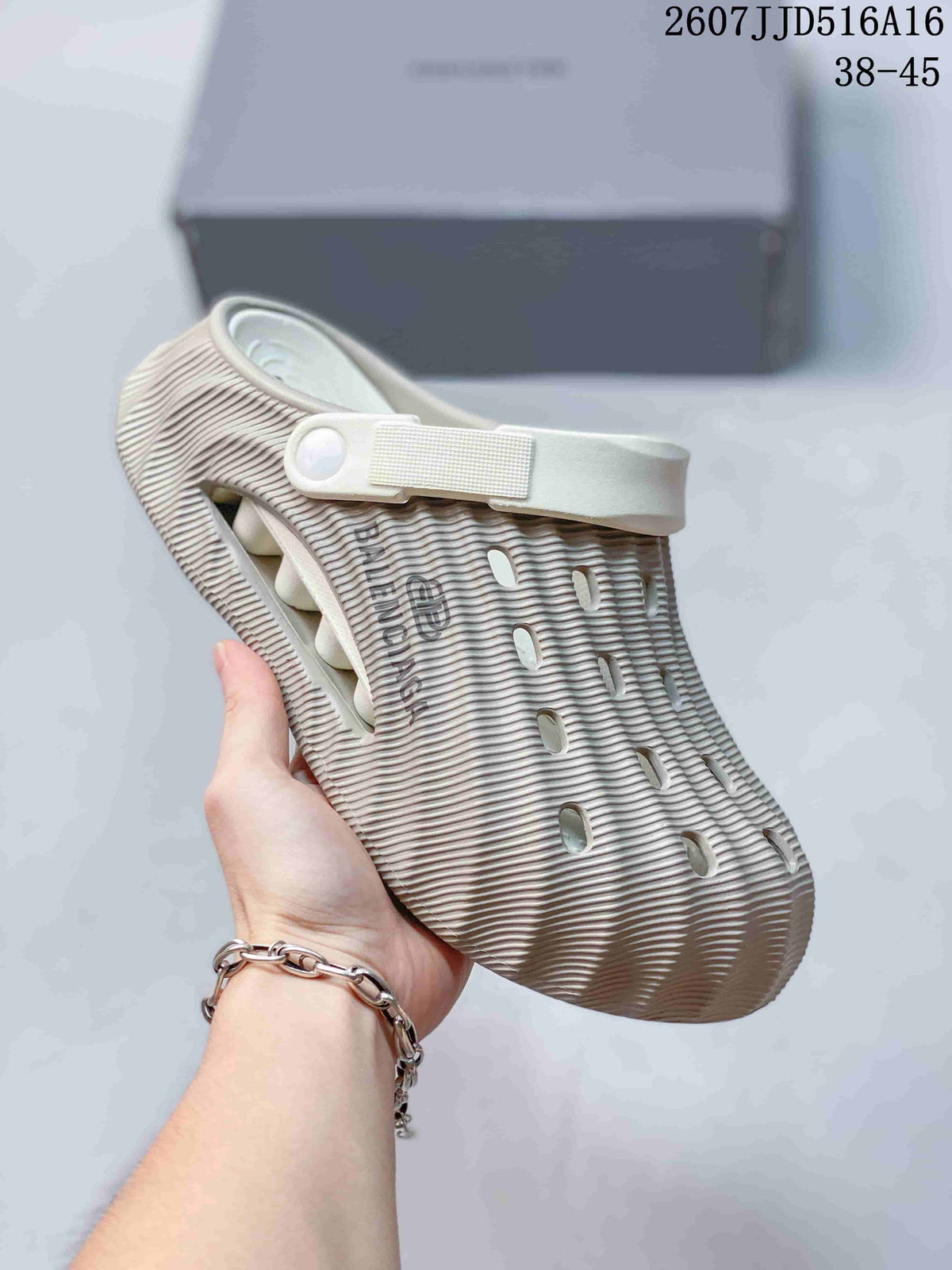 Logo Clog Sandals in Off-White with Brown Strap by Balenciaga - product image from the listing.