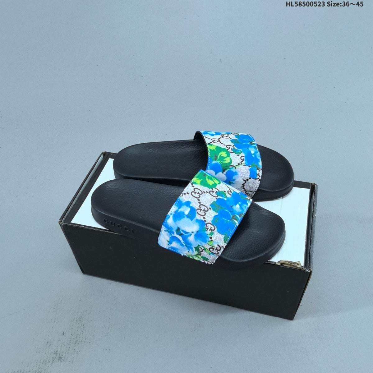 HL58500523 Monogram Slide Sandals by Gucci - product image from the listing.
