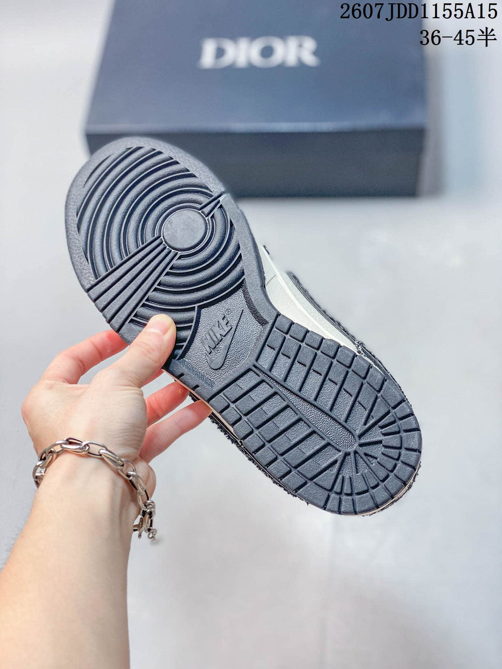 Nike SB Dunk Low White Navy Dior Pattern Trainers - product image from the listing.