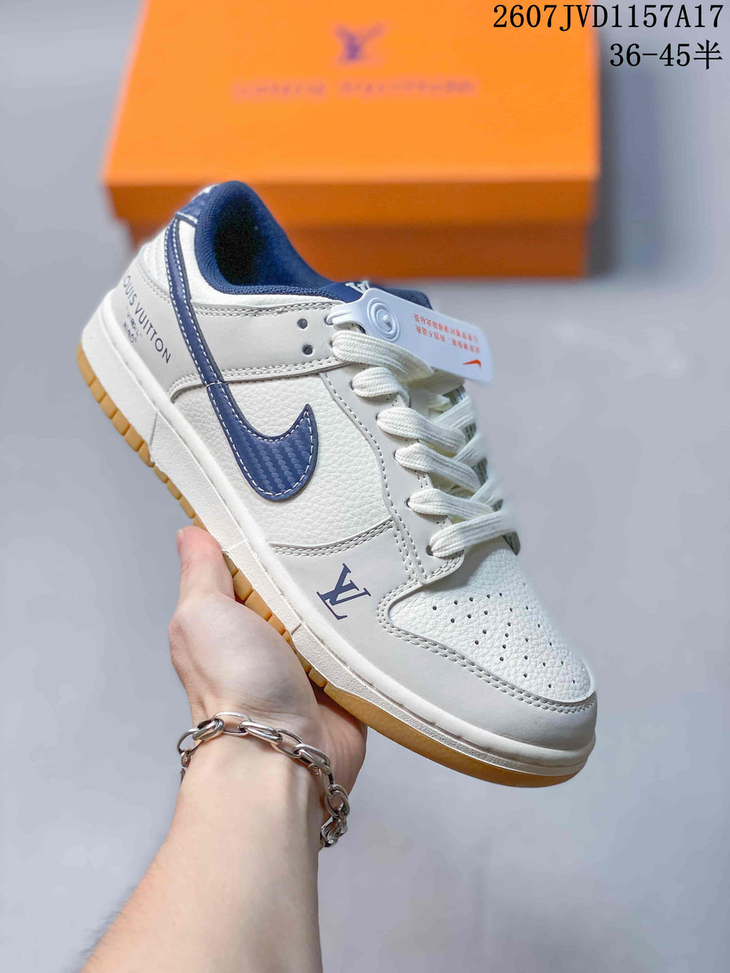 Louis Vuitton x Nike Dunk Low Sneakers in Blue Denim 2607JVD1157A17 - product image from the listing.