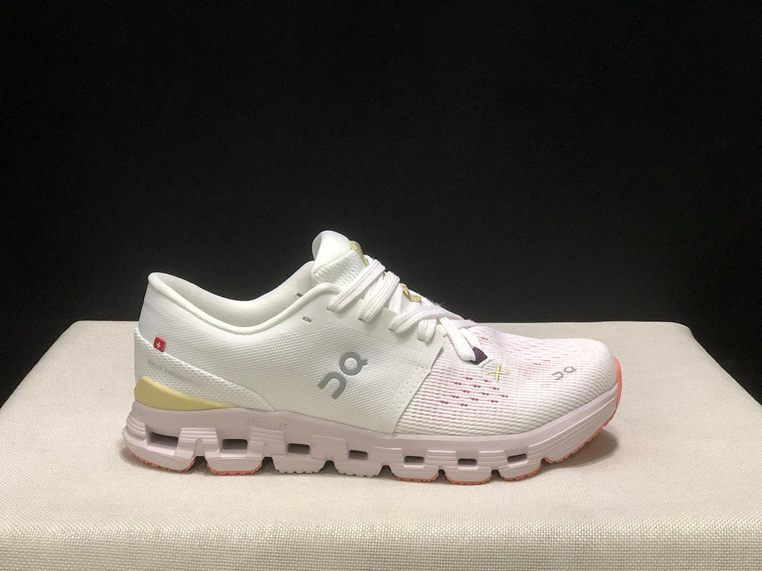 On Cloud X 4 Sneakers in White Yellow Pink - product image from the listing.