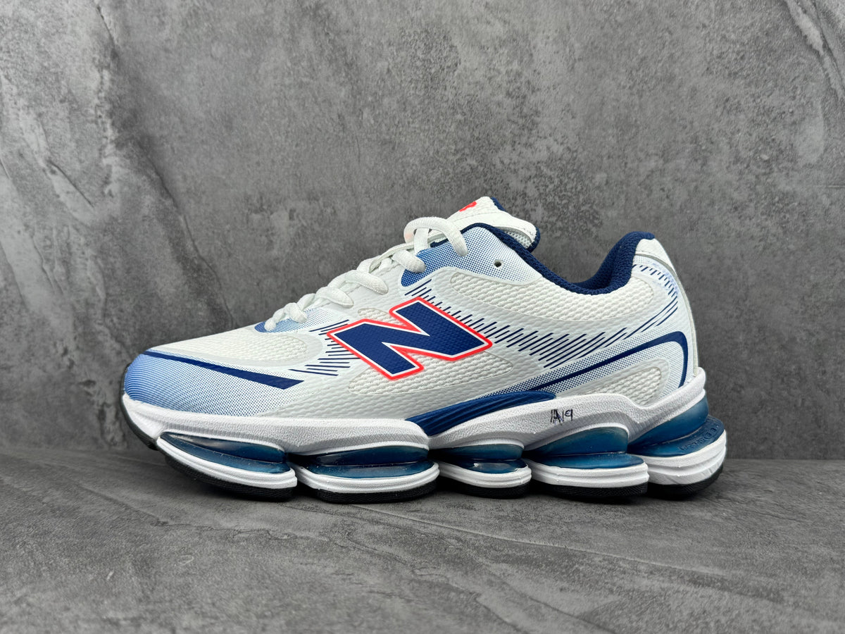 New Balance Running Sneakers in White and Navy - product image from the listing.
