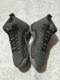 Black and Grey Air Jordan 12 High-Top Sneakers - product image from the listing.