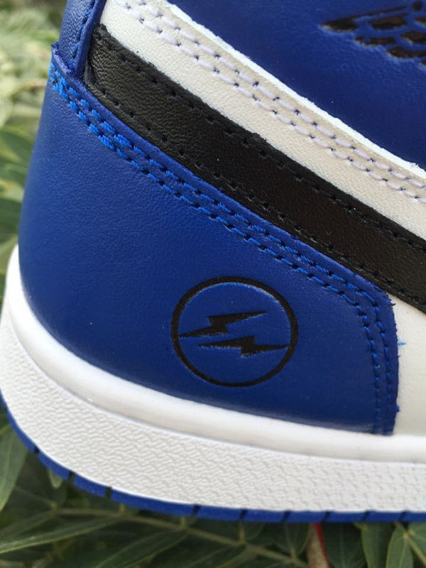 Jordan 1 High Sneakers in Black, in White and Royal Blue - product image from the listing.