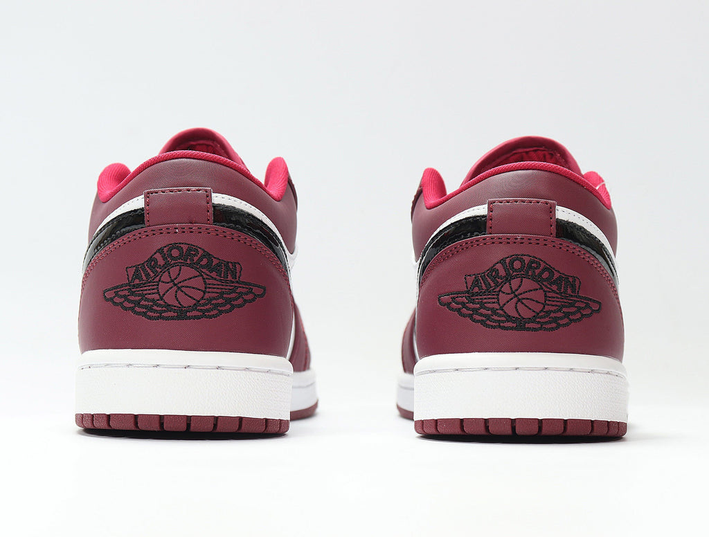 Jordan 1 Low White and Rose Sneakers in Red 553558-604 - product image from the listing.