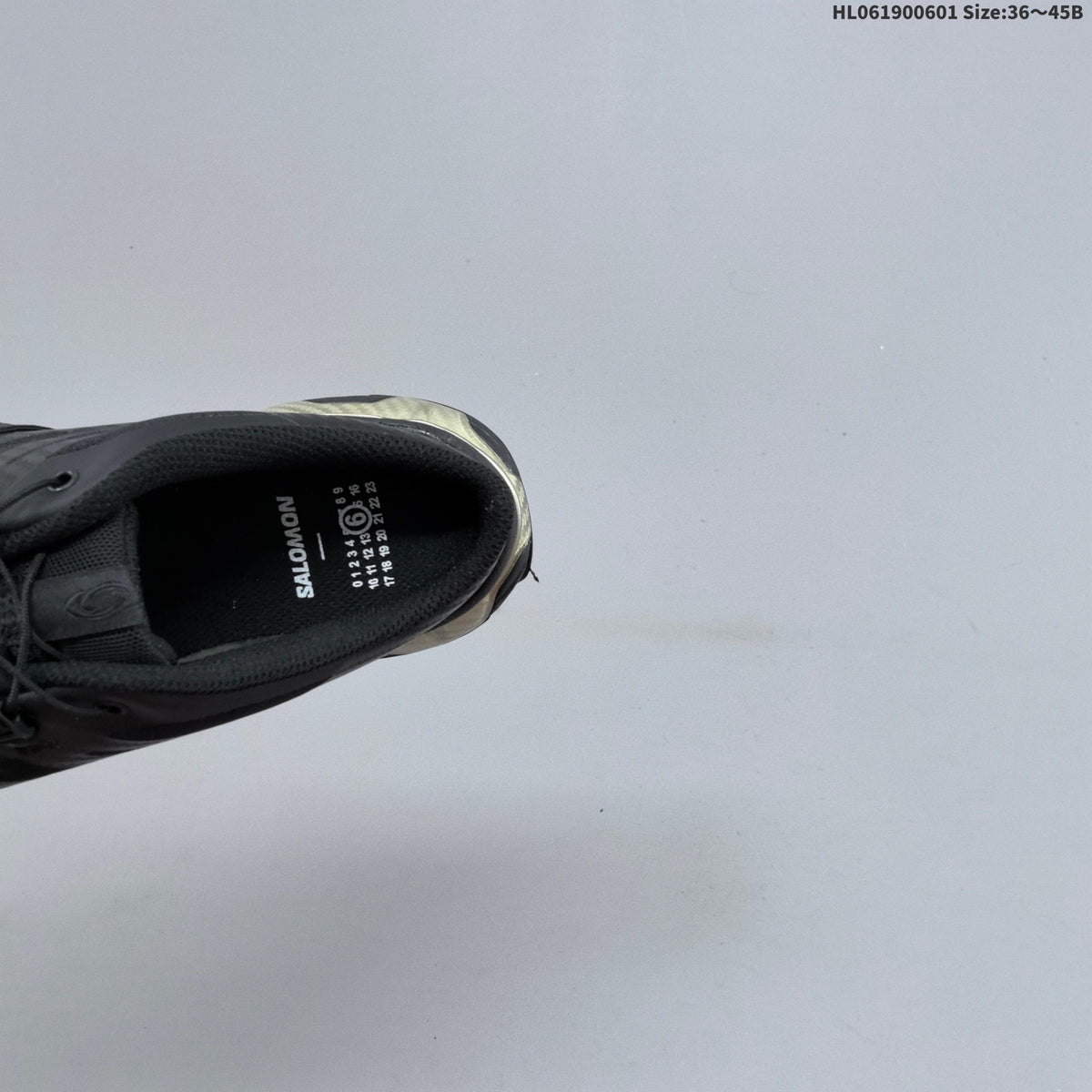 Black and Silver Salomon XT-4 Mule Sneakers - product image from the listing.