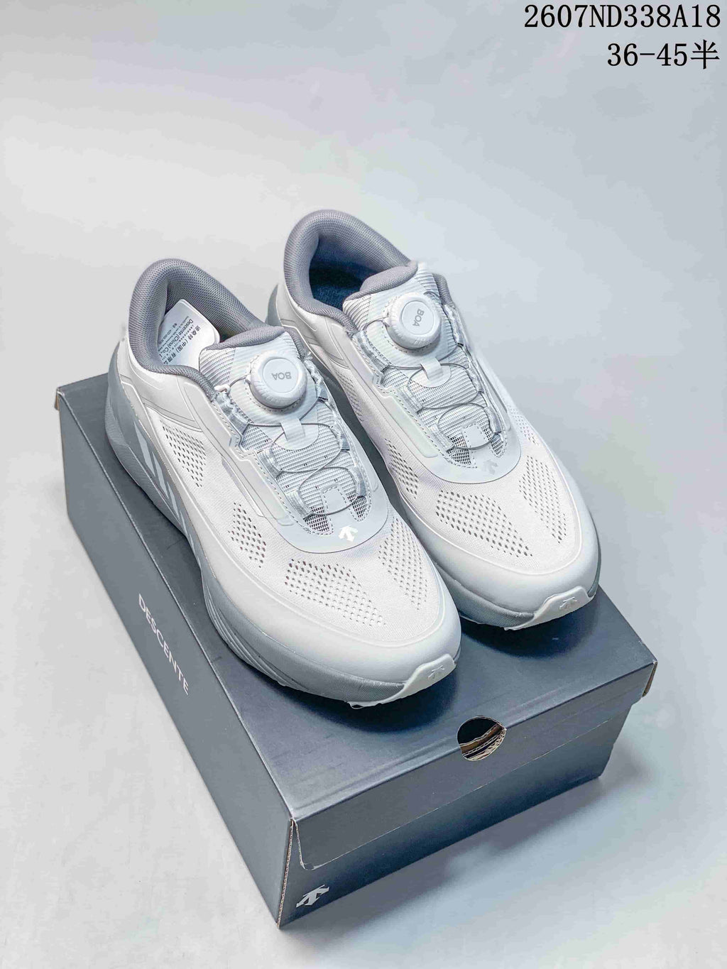 White and Black Descente D.F. Wire 3.0 Sneakers - product image from the listing.