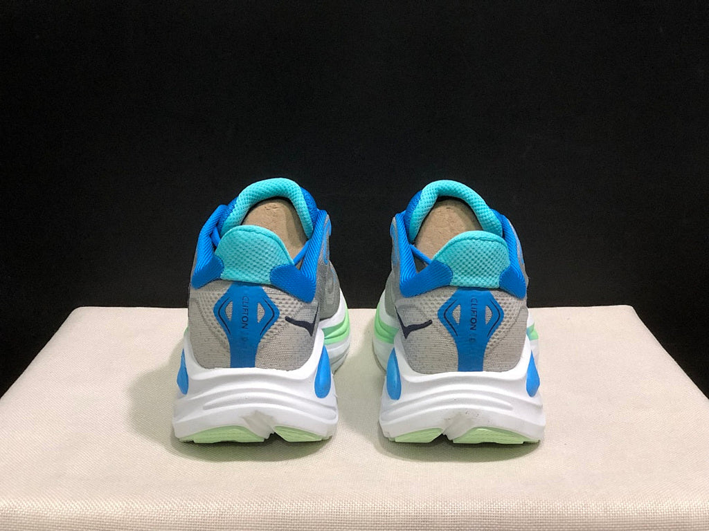 Gray and Blue HOKA Clifton 10 Running Shoes - product image from the listing.
