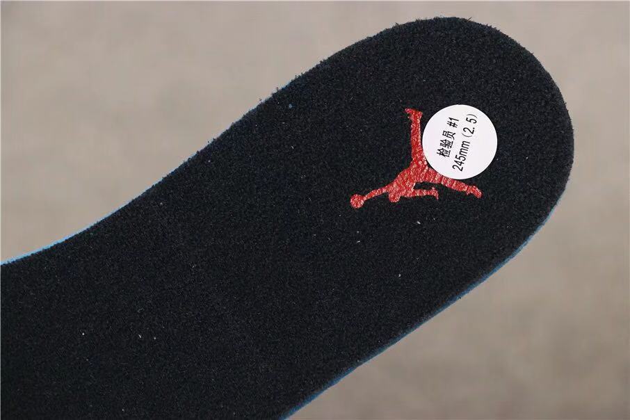 Air Jordan 12 Reverse Taxi Sneakers Black 153265-017 - product image from the listing.