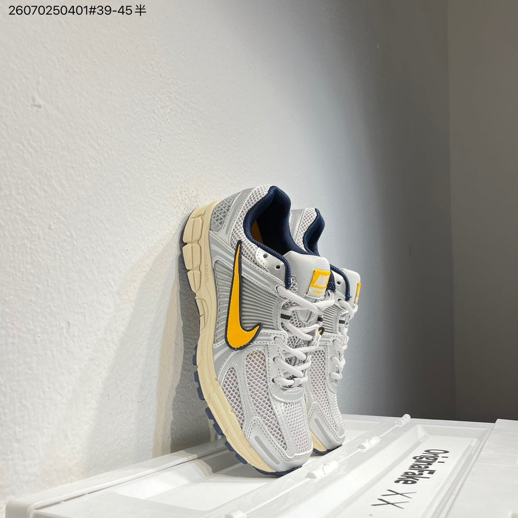 Nike Air Zoom Vomero 5 Running Shoes in White Grey Yellow - product image from the listing.