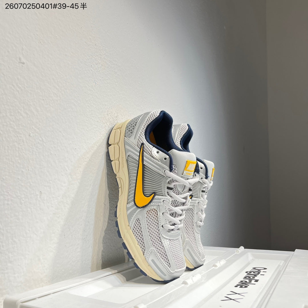 Nike Air Zoom Vomero 5 Running Shoes in White Grey Yellow - product image from the listing.