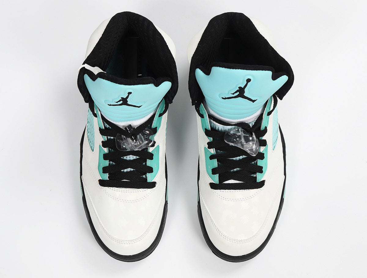 Jordan 4 Retro Sneakers in White and Mint CN2932-100 - product image from the listing.