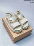 Women's UGG GoldenGlow Platform Sandals in White - product image from the listing.