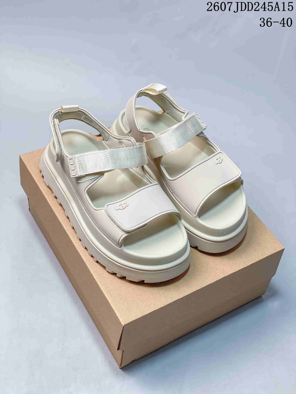 Women's UGG GoldenGlow Platform Sandals in White - product image from the listing.