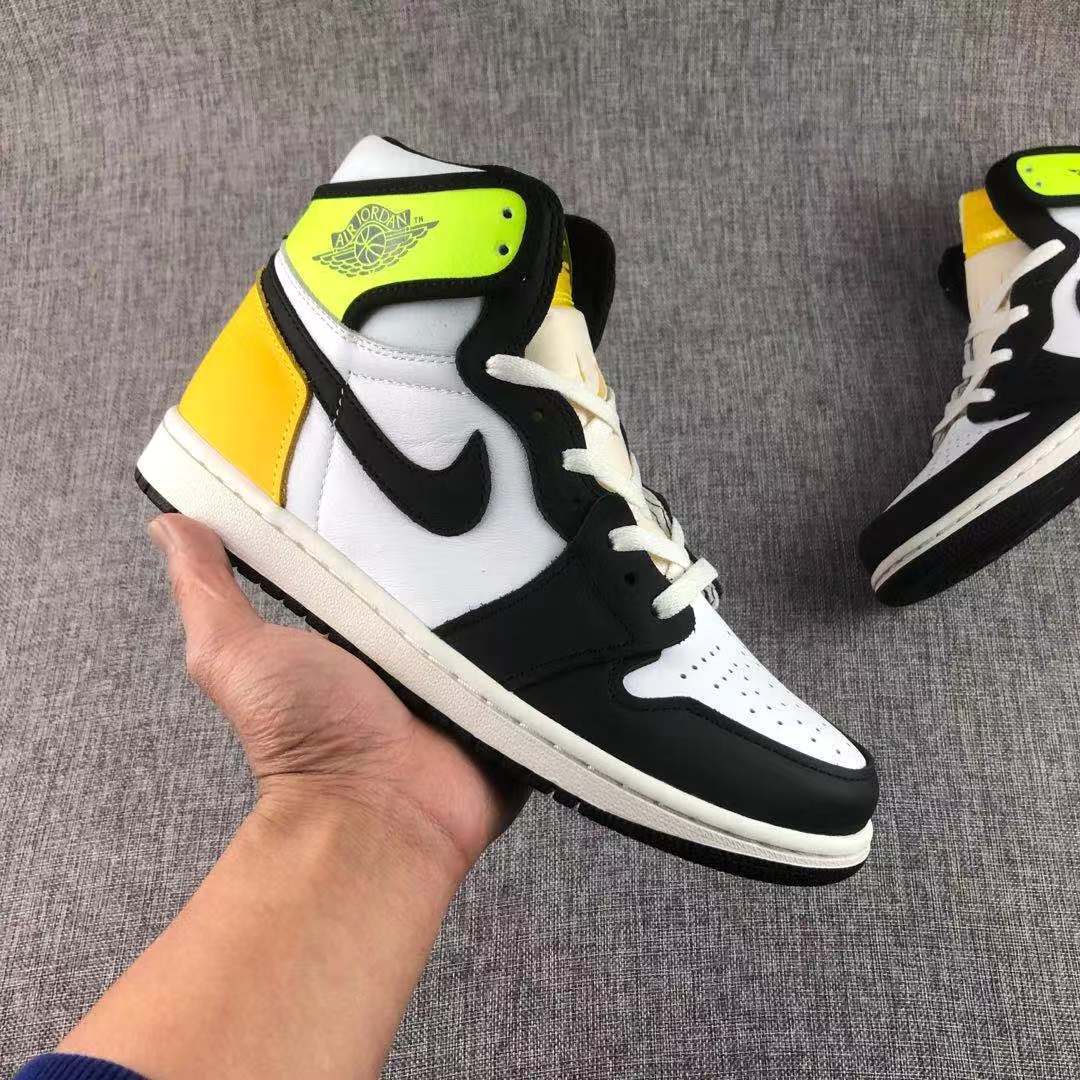 Air Jordan 1 High OG Volt Gold Sneakers Black White - product image from the listing.