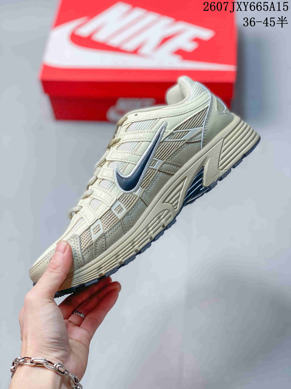 Nike P-6000 Trainers Cream Navy Style 2607JXY665A15 - product image from the listing.