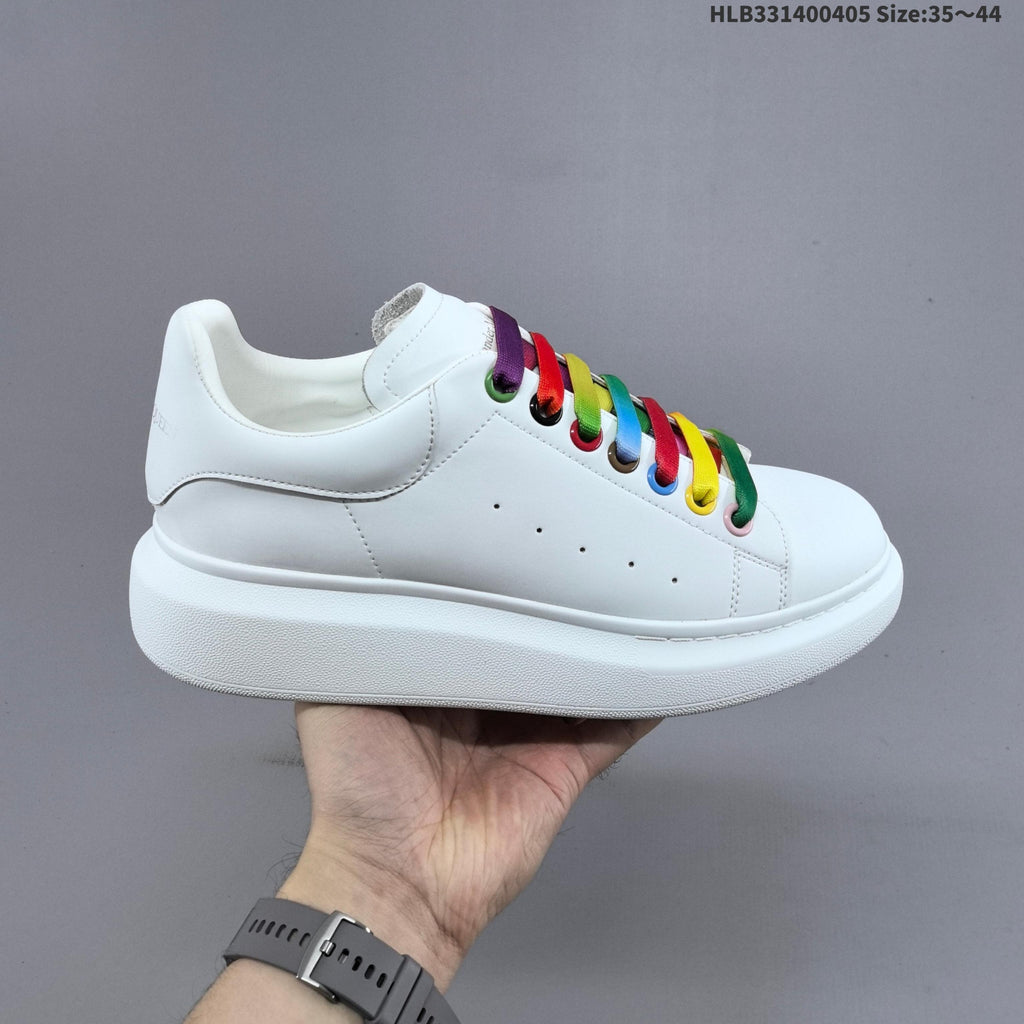 Alexander McQueen Oversized Low-Cut Sneakers, Black and Gold, HLB331400405 - product image from the listing.
