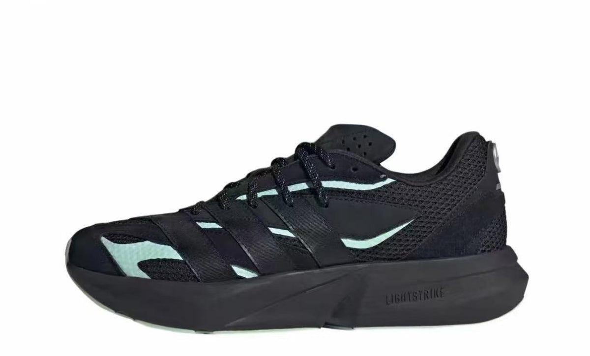 JR1058 Running Sneakers in Black and Mint - product image from the listing.
