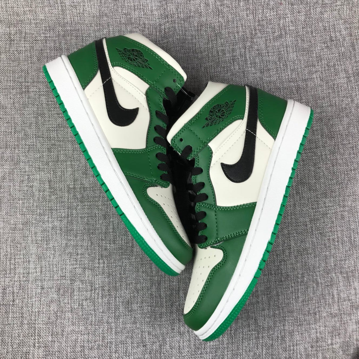 Air Jordan 1 Mid Celtics White Green Black Sneaker 852542-301 - product image from the listing.
