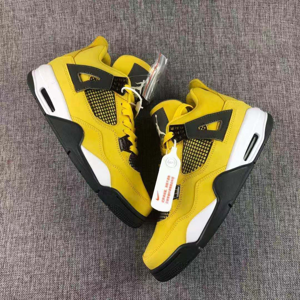 Air Jordan 4 Lightning Yellow Black Sneakers - product image from the listing.