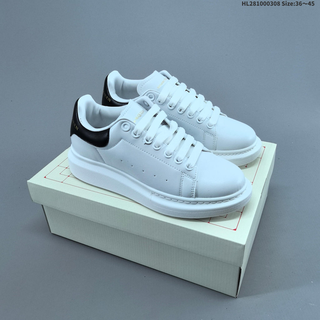 Alexander McQueen Oversized Low-Top Sneakers, in White and Black HL281000308 - product image from the listing.