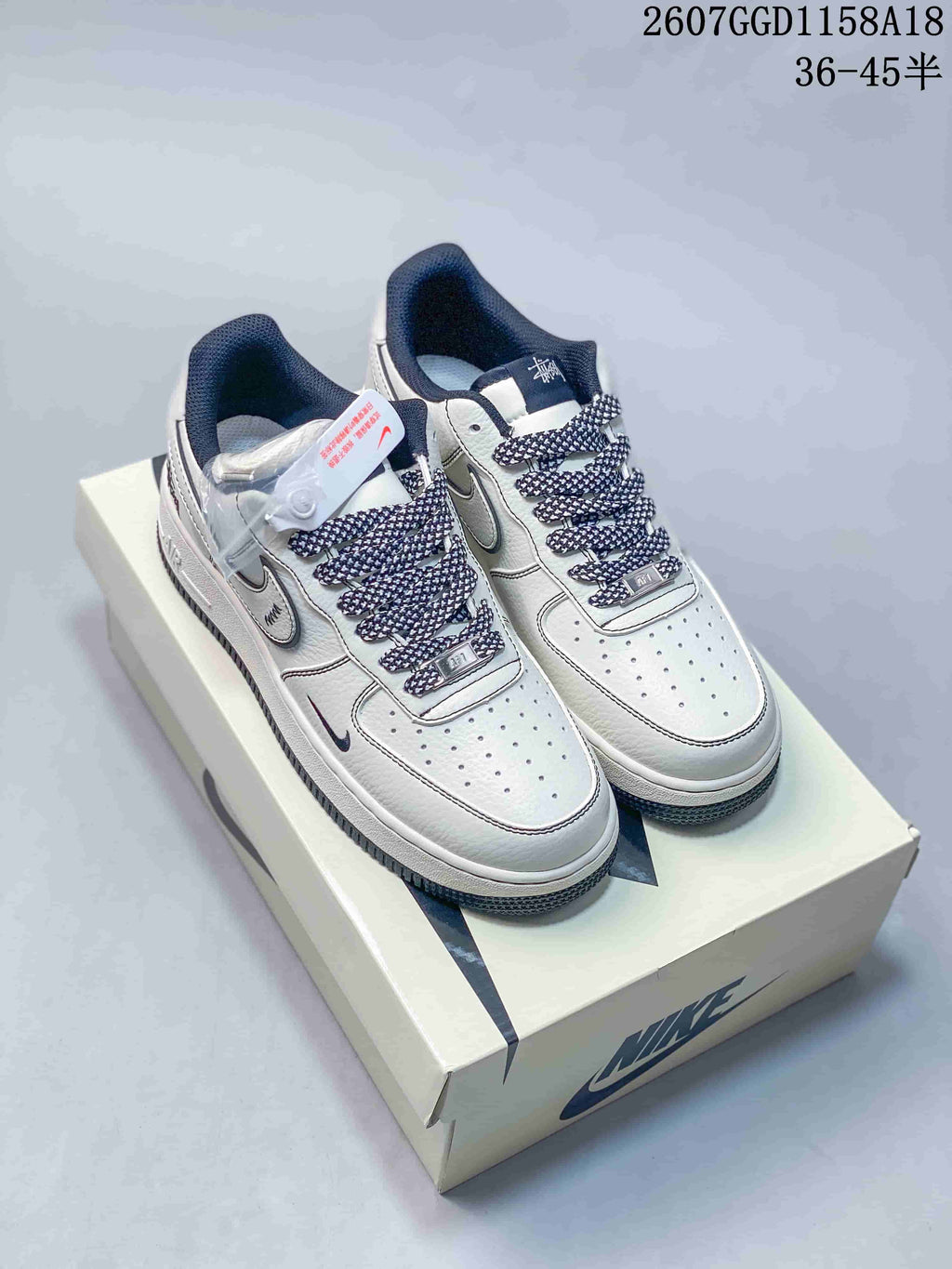 Nike Air Force 1 '07 Low-Top Sneakers in White Navy - product image from the listing.