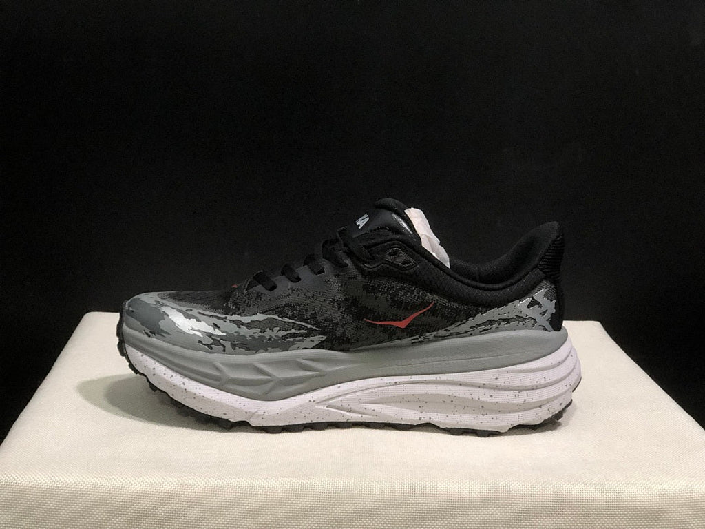 Black and Gray HOKA Stinson 7 Trail Running Shoes - product image from the listing.