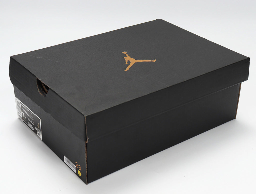 Jordan 1 Low Sneakers in Yellow Orange 554725-870 - product image from the listing.