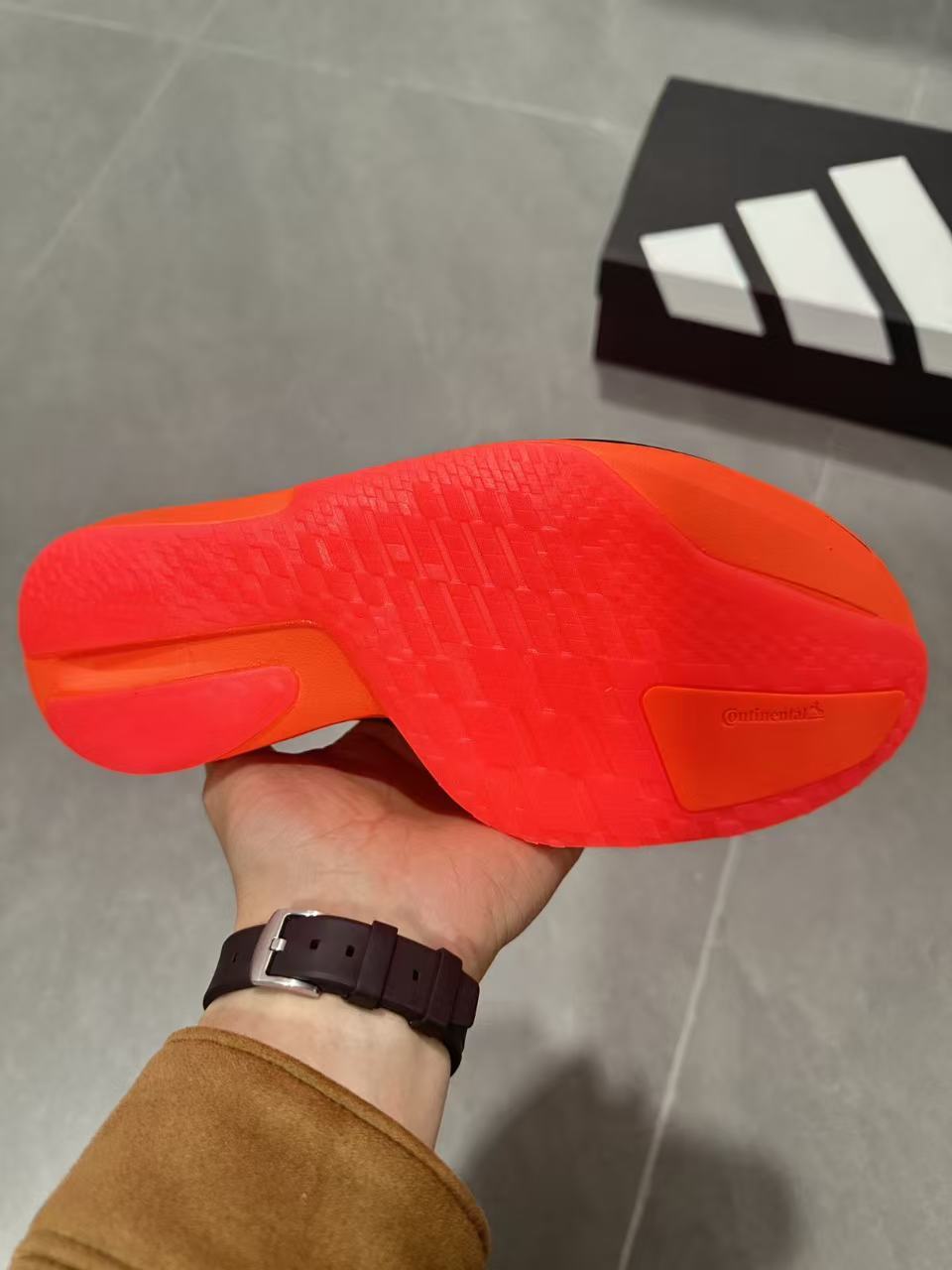 Adidas Adizero Adios Pro 5 Running Shoes, in Red and Lime - product image from the listing.