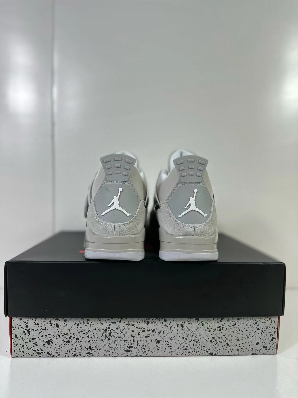 Air Jordan 4 Light Iron Ore Frozen Moments Sneakers - product image from the listing.