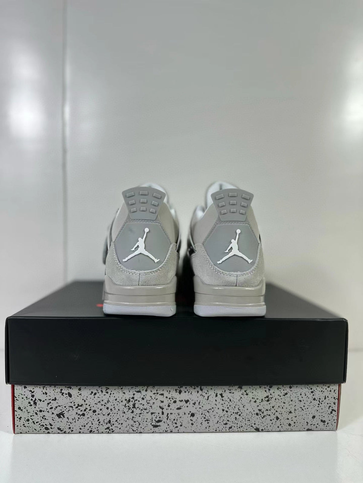 Air Jordan 4 Light Iron Ore Frozen Moments Sneakers - product image from the listing.