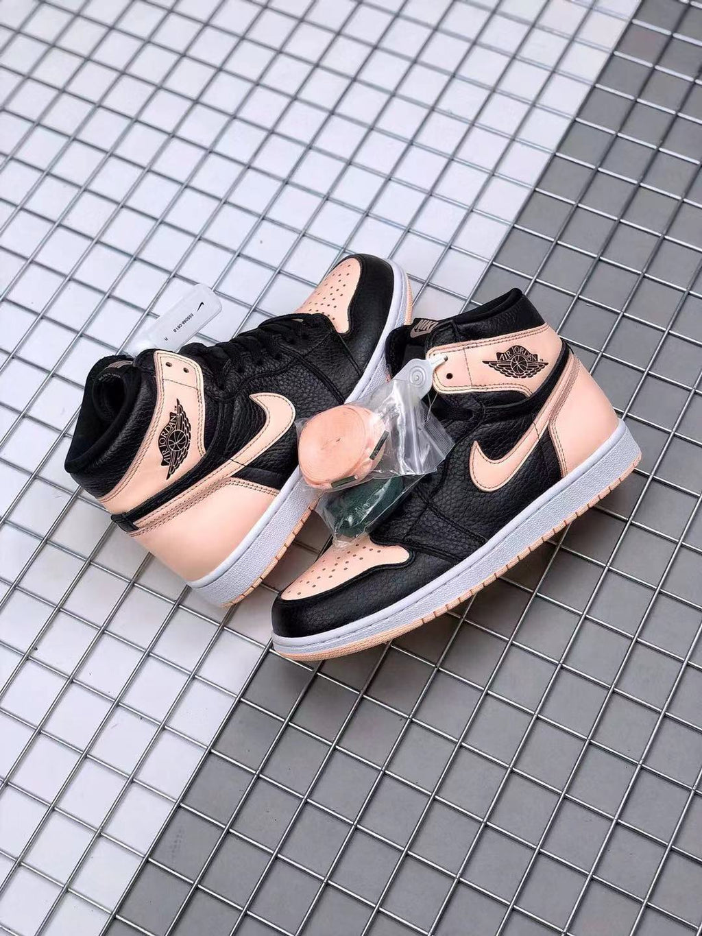 Air Jordan 1 High OG Crimson Tint Sneakers in Black Pink - product image from the listing.