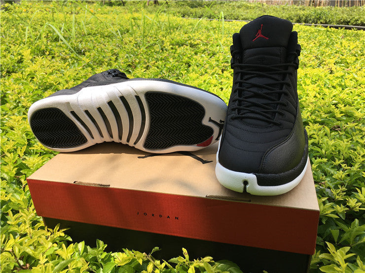 Air Jordan 12 Black Nylon High-Top Sneakers - product image from the listing.