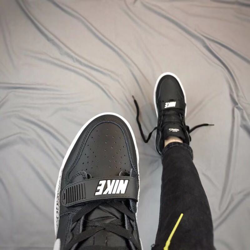 Air Jordan Legacy 312 High-Top Sneakers in Black and White - product image from the listing.