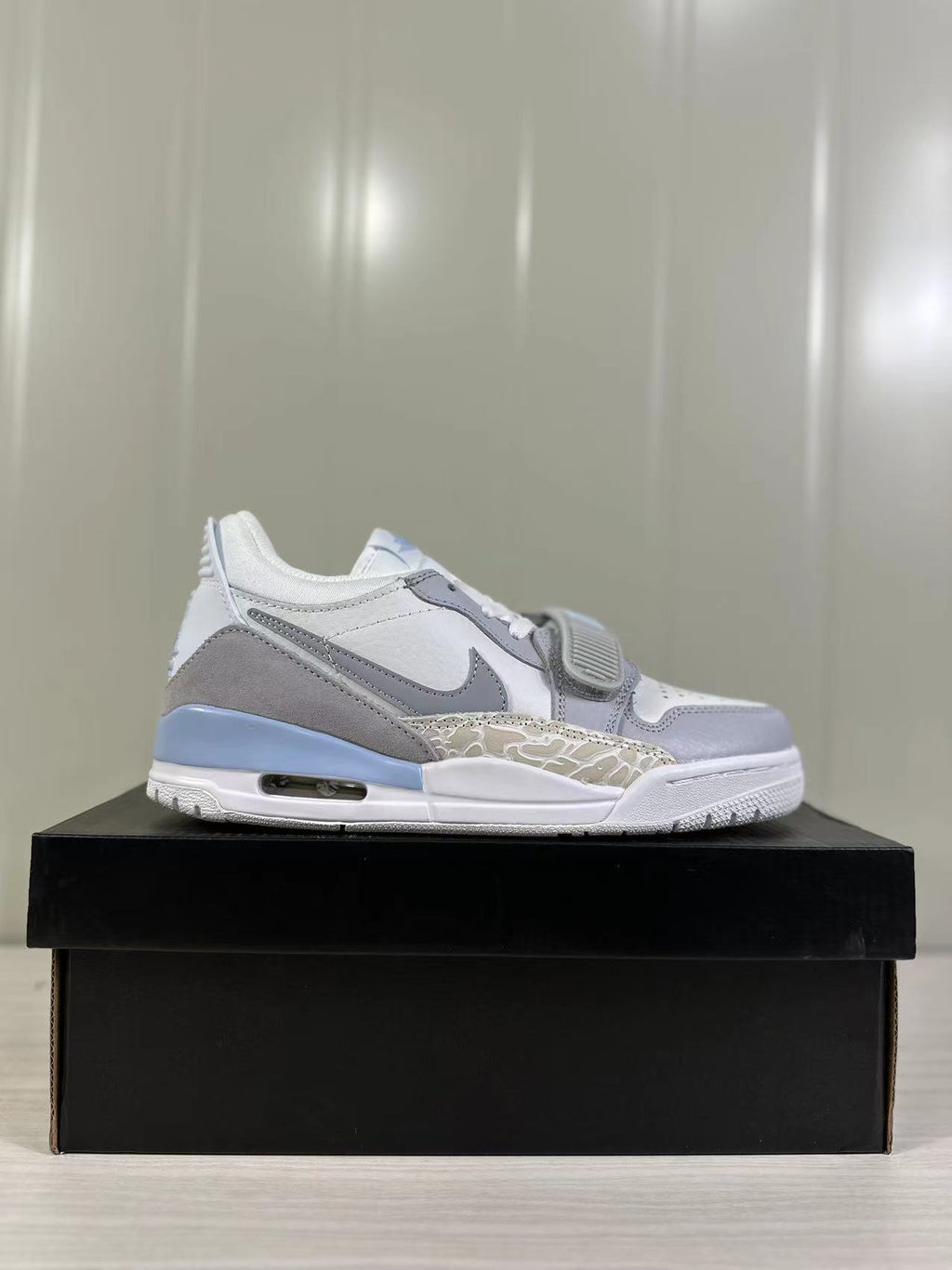 Jordan Legacy 312 Low Sneakers in Glacier Blue HQ1190-101 - product image from the listing.